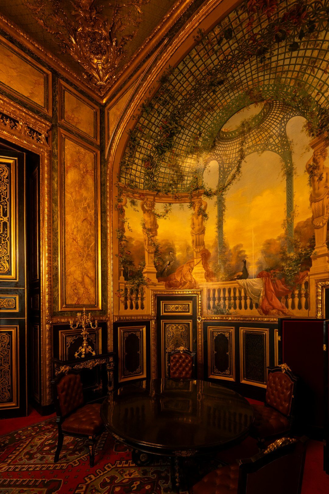Interior of a classic Argentine theatre with red velvet seats and gilded balconies