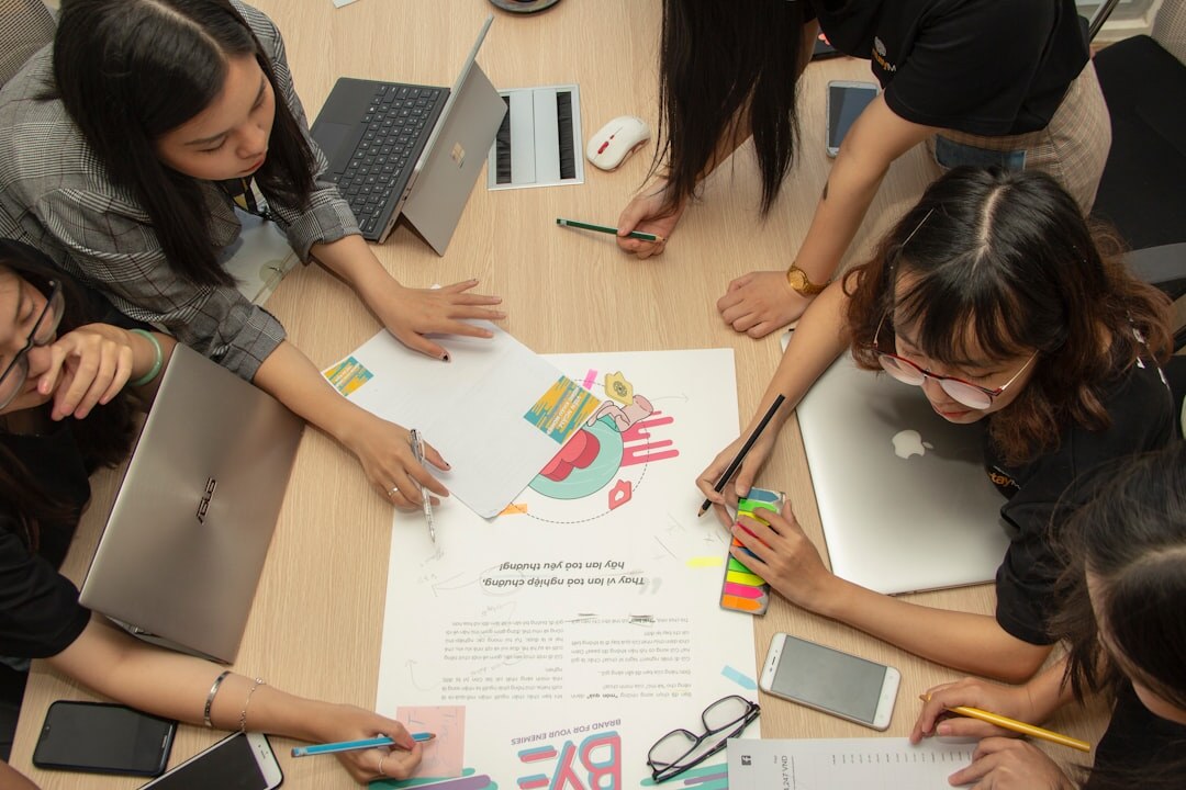 team discussing magazine redesign